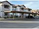 Covered parking area with parked cars in front of an apartment building at 45 Maleena Mesa St # 1011, Henderson, NV 89074