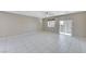 Open living room with tile floors and lots of natural light at 5020 Pioneer Scout St, North Las Vegas, NV 89031