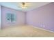 Spacious bedroom with neutral walls and carpet at 7629 Homing Pigeon St, North Las Vegas, NV 89084