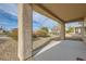 Covered patio with view of desert landscaping at 7629 Homing Pigeon St, North Las Vegas, NV 89084