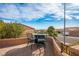 Spacious patio with table and chairs, offering scenic views at 10412 Willamette Pl, Las Vegas, NV 89134