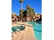 Community pool and spa with lounge chairs at 1050 E Cactus Ave # 1072, Las Vegas, NV 89183