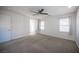 Bright bedroom with carpet and ceiling fan at 12241 Regal Springs Ct, Las Vegas, NV 89138