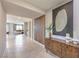 Inviting entryway with wood slat wall detail and a view into the living area at 1922 Molly Brook Dr # Lot 6, North Las Vegas, NV 89084