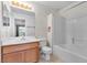 Bathroom with shower/tub combo, single vanity, and tile flooring at 2725 Stars End St, Las Vegas, NV 89108