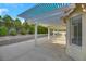 Covered patio with concrete floor and landscaping at 2727 Coventry Green Ave, Henderson, NV 89074