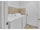 Laundry room with side-by-side washer and dryer at 2727 Coventry Green Ave, Henderson, NV 89074