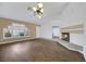 Living room centered on the fireplace and showing access to another area of the house at 2727 Coventry Green Ave, Henderson, NV 89074