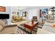 Living area with hardwood floors, a neutral color palette, and mid-century modern furniture at 2820 Linkview Dr, Las Vegas, NV 89134