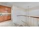 Hallway overlooking the stairs and featuring built-in cabinetry at 3138 Laurel Ave, Henderson, NV 89014