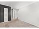 Empty bedroom with carpet flooring and feature wall at 320 Brookside Ln # C, Las Vegas, NV 89107