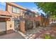 Front view of a two-story townhome with balconies at 320 Brookside Ln # C, Las Vegas, NV 89107