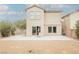 Two-story house with a large backyard and patio at 3325 Edinboro Ridge Ave, North Las Vegas, NV 89081