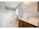 Bathroom with tub, shower, and vanity at 3325 Edinboro Ridge Ave, North Las Vegas, NV 89081