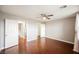 Bright bedroom with wood floors and ceiling fan at 3325 Edinboro Ridge Ave, North Las Vegas, NV 89081