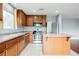 Modern kitchen with stainless steel appliances and an island at 3325 Edinboro Ridge Ave, North Las Vegas, NV 89081