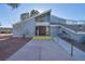 Clubhouse entrance with double doors, a large window, and an accessible ramp at 2472 Paradise Village Way, Las Vegas, NV 89120