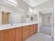 Double vanity bathroom with a view of a bedroom at 2604 Mourning Warbler Ave, North Las Vegas, NV 89084