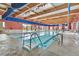 Indoor community lap pool with ample seating at 2604 Mourning Warbler Ave, North Las Vegas, NV 89084