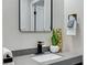 Modern bathroom vanity with sleek sink and gold faucet at 2895 Sunlit Glade Ave, Henderson, NV 89074