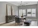 Elegant dining room featuring stylish furniture and modern chandelier at 2895 Sunlit Glade Ave, Henderson, NV 89074