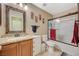 Bathroom with single vanity, granite countertop, and tub shower combo at 3181 Mist Effect Ave, Henderson, NV 89044