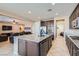 Spacious kitchen with island, stainless steel appliances, and granite countertops at 7506 Fort Mcdermitt Ave, Las Vegas, NV 89179