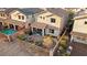 Aerial view of a backyard with patio, fire pit, and swimming pool at 23 Papavero Ct, Henderson, NV 89011