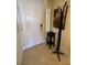 Bright entryway with a coat rack and small side table at 230 E Flamingo Rd # 223, Las Vegas, NV 89169