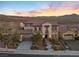 Luxury two-story home with stunning sunset views and gated entry at 2381 Luberon Dr, Henderson, NV 89044