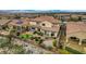 Aerial view of house and putting green at dusk at 2381 Luberon Dr, Henderson, NV 89044