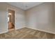 Spacious bedroom with ensuite bathroom access and neutral color palette at 2381 Luberon Dr, Henderson, NV 89044