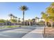 Gated community entrance with palm trees at 2381 Luberon Dr, Henderson, NV 89044