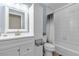 Clean bathroom with white vanity, shower/tub combo at 260 E Desert Rose Dr, Henderson, NV 89015