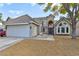 Front exterior of a two-story home with attached garage and driveway at 2632 Cathedral Ln, Las Vegas, NV 89108