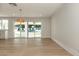 Dining area with sliding glass doors opening to a pool view at 3575 Tioga Way, Las Vegas, NV 89169