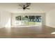 Living room with sliding glass doors opening to the pool area at 3575 Tioga Way, Las Vegas, NV 89169