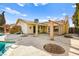 Backyard with pool, covered patio, and desert landscaping at 3866 S Torrey Pines Dr, Las Vegas, NV 89103