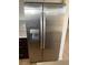 Stainless steel refrigerator with ice and water dispenser in a modern kitchen at 4454 Bertram Ln, Las Vegas, NV 89147