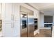 Stainless steel appliances in a white kitchen at 6585 Coronado Crest Ave, Las Vegas, NV 89139