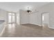 Bright and airy living room with high ceilings and tile floors at 7832 Red Leaf Dr, Las Vegas, NV 89131