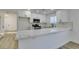 Modern kitchen with white cabinets and quartz countertops at 1100 Maserati Dr, Las Vegas, NV 89117