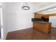 Dining area adjacent to the kitchen with updated light fixture at 1302 Capri Dr # B, Boulder City, NV 89005