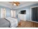 Bedroom with walk-in closet and wood floors at 3550 Bay Sands Dr # 2101, Laughlin, NV 89029