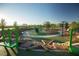 Modern playground with slides and climbing structures at 361 Andy Wheeler Dr, Henderson, NV 89011