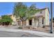 Two-story house with a tree in front and a two-car garage at 6812 Colfax Crest St, Las Vegas, NV 89131