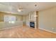 Spacious living room with hardwood floors and fireplace at 7151 S Durango Dr # 214, Las Vegas, NV 89113