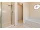 Spacious bathroom featuring a shower, bathtub, and tile flooring at 2231 Camel Mesa Dr, Laughlin, NV 89029