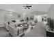 Bright living room with comfy seating and a view into the dining area at 3159 Vistoso Cir, Henderson, NV 89014