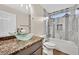 Bathroom with shower/tub combo and granite countertop at 4038 Sparrow Rock St, Las Vegas, NV 89129